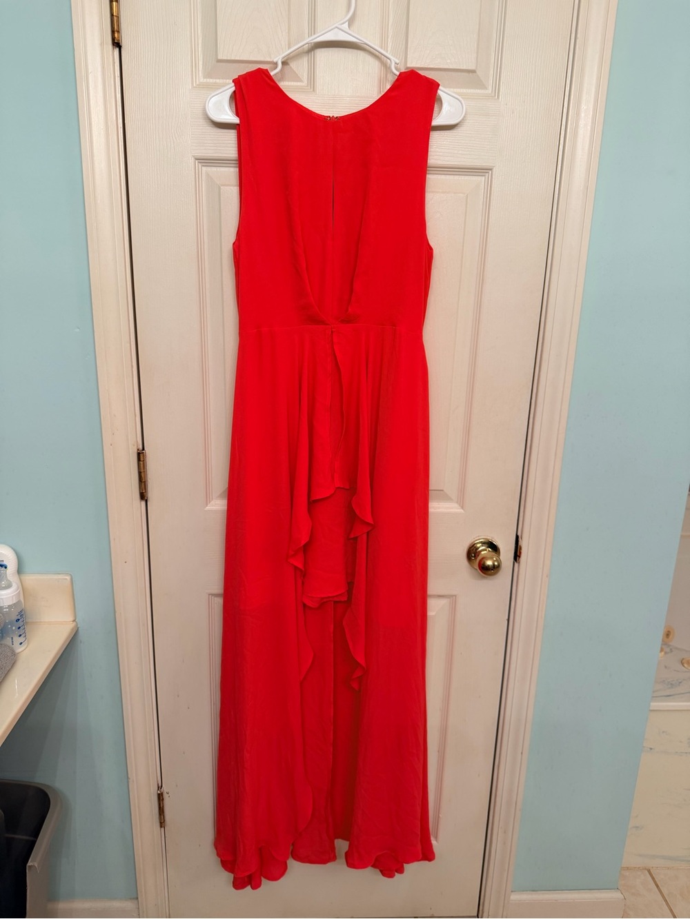 Strut and bolt high-low dress